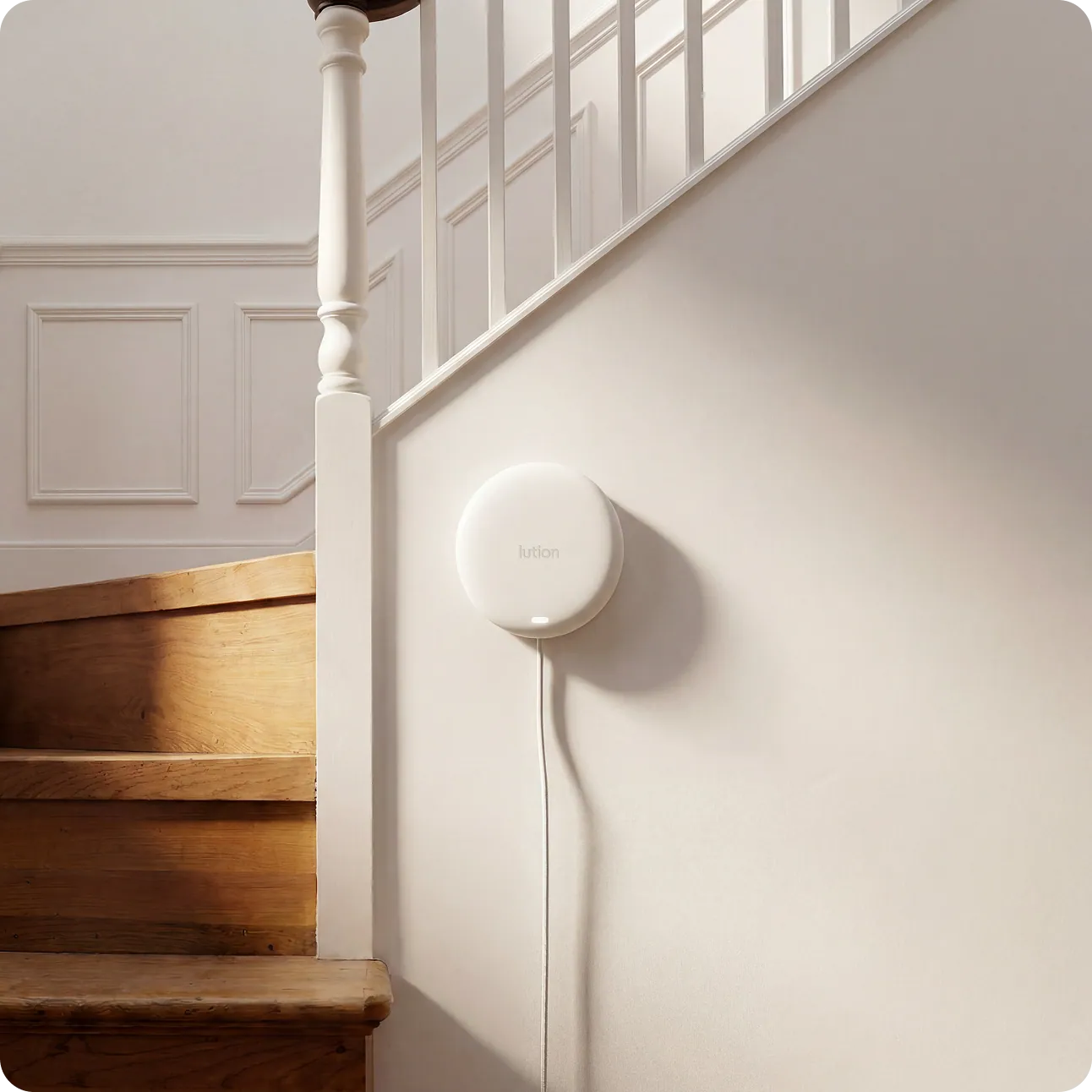 A Lution sensor installed on a wall in a home